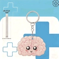 Detail view of 2D acrylic pink brain keychain showing 0.25cm thickness and cute face - Cartoon Brain (4)