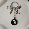 Detailed medical keychain with nurse hat, stethoscope, and letter N pendant charm - Letter N