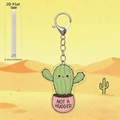 Portachiavi cactus in acrilico con testo 'NOT A HUGGER' e design di scena del deserto 2D - Cactus Singolo Stile A (1)