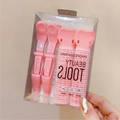 Rosa Volumen-Haarclip-Set mit zwei Rollern und Clips in transparenter Verpackung - Lockenwickler Und Klammern Kombi-Set / Rosa