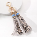 Golden double tassel keychain with leopard print and lobster clasp for bags and car keys - Leopard Print Mixed Colors