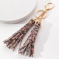 Leopard print tassel keychain with dual coral pink leather fringe and gold metal ring - Leopard Print