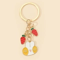 Detail of cute rabbit and red strawberry charms on a golden alloy keychain pendant - Rabbit And Strawberry Style (9)