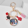 Detail of Teacher Appreciation keychain with apple charms and pink tassel on stone - HAPPY TEACHERS' DAY (8)