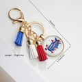 Close-up of President's Day keychain with map pendant, colorful tassels and golden lobster clasp - Happy President's Day (Style 6)