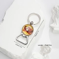 Detail of metal eagle flag keychain with bottle opener on decorative white stone - Round Eagle Flag Pendant (Style 6)