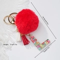 Detail of red pompom keychain with fruit resin letter L showing size 14.5cm and weight 21g - Letter L