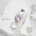 Macro view of multifunctional USA flag nail clipper keychain with dimensions on stone surface - Statue of Liberty USA (Style 8)