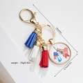Detail of USA themed keychain with flag eagle glass gem and colorful suede tassel - Statue of Liberty USA (Style 12)