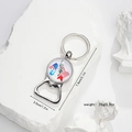 Detail view of silver multi-functional bottle opener keychain with USA flag design - Statue of Liberty and USA (Style 10)