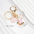 Detailed size view of cute enamel bunny keychain with length and weight measurements - Rainbow Bunny (Style 5)