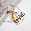 Detail view of LOVE keychain with sunflower, yellow tassel and size dimensions shown - LOVE Letter Sunflower Style (Style 5)