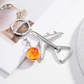 Silberner Flugzeug-Flaschenöffner-Schlüsselanhänger mit orangem Glas-Anhänger - Orangeroter Planetenstil (01)