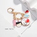 Porte-clés infirmière doré avec pompon rose et breloque de stéthoscope en forme de cœur - Style Infirmière Médicale (06)