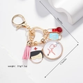 Porte-clés infirmière avec pompon rose et breloques médicales sur anneau doré - Style Infirmière Médicale (08)