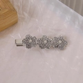 Fermaglio per capelli Y2K a stella argentata con strass brillanti e centro traforato - Stile Triplo Fiore (B-2718-3)