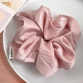 Pink oversized satin scrunchie with soft silk sheen and elegant brand woven label - Pink
