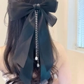 Elegante fermaglio per capelli con fiocco in organza nera e nappine lunghe di perle lucide - Nero (D-5137-1)