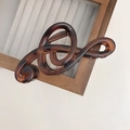 Elegante molletta per capelli a forma di chiave di violino in tartaruga ambrata opaca - Marrone