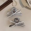 Close-up of marble acetate bow hair claw clips with silver metallic ribbon details - Dark Gray Cloud Pattern Silver Bow Style (D-5323-5)