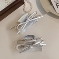 Detail view of silver bow hair claw clips with marble resin texture and gold spring accents - Gray-Brown Cloud Pattern Silver Bow Style (D-5323-6)