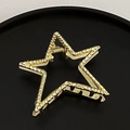 Minimalist gold star hair claw clip with unique hammered metal finish for women - Gold