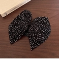 Polka dot bow hair claw clip in black and white fabric over a vintage wooden background - Black with White Polka Dots (D-5617-1)