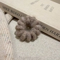 Detail of brown fuzzy plush spiral hair tie on soft knit fabric for girls - Brown Spiral Plush Style (D-5637-1)
