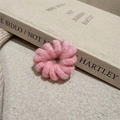 Close-up of pink knit hair tie featuring a spiral flower design and soft woolen texture - Pink Spiral Plush Style (D-5637-2)