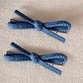 Pair of blue denim texture bow hair clips for women with a vintage casual style design - Small / Light Blue