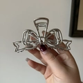 Silver metallic butterfly hair claw clip with a hollow liquid metal design for women - Silver