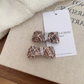 Set of two French tweed bow hair clips with white faux pearls in brown and orange patterns - Brown