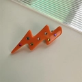 Einzigartige Haarspange in Blitzform aus orangefarbenem Acetat mit bunten Stern-Pailletten - Orange