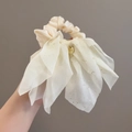 Chouchou élégant en satin blanc crème avec un grand nœud en mousseline à paillettes dorées - Style Pailleté Blanc