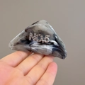 Detailed close-up of marble pattern triangle hair claw clip with No.5 rhinestone decor - Marble Pattern (D-5813-1)