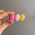 Macro view of candy-colored hair clip with pink and yellow oval resin decorations - Rose Pink and Yellow Candy Color(D-5245-1)