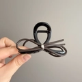 Black hair claw clip with dark brown leather cord bow and silver ring detail - Black Bowknot Leather Cord Style (D-5848-1)