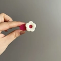 Close-up of a small white and pink floral resin hair clip for kids and girls - Pink and White Style (B-2213-4)