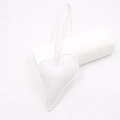 Close-up of white heart-shaped leather bag charm with stitched edges and long lanyard strap - White