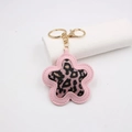 Pink leopard print flower keychain accessory with gold hardware and PU leather edge - Faux Hair Pink Leopard