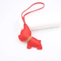 Detail of red leather French bulldog bag charm with stitched strap and gold buckle - Red