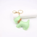 Detail of light green leather schnauzer keychain with brown collar and gold metal clasp - Light Green