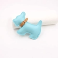 Close-up of sky blue leather Scottie dog charm with lychee grain and gold metal buckle - Light Blue