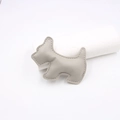 Detail of grey Schnauzer dog leather charm with neat edge stitching and punch hole - Gray