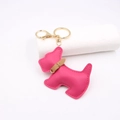 Detailed view of the dark pink faux leather schnauzer keychain with gold alloy lobster clasp - Rose Red