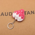 Close-up of pink and white PU leather strawberry keychain with fine stitching detail - Rose Red