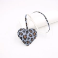 Detailed view of the blue leopard print heart leather charm with fine edge stitching detail - Light Blue