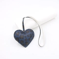 Detail of blue leopard print heart leather bag charm with white hanging strap - Navy Blue