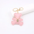 Schlüsselanhänger aus rosa Kunstleder in Bärenform mit goldenem Karabinerhaken - Bär / Rosa