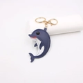 Kreativer Delfin-Leder-Schlüsselanhänger in Blau und Weiß mit goldenem Metallring und Karabiner - Marineblau